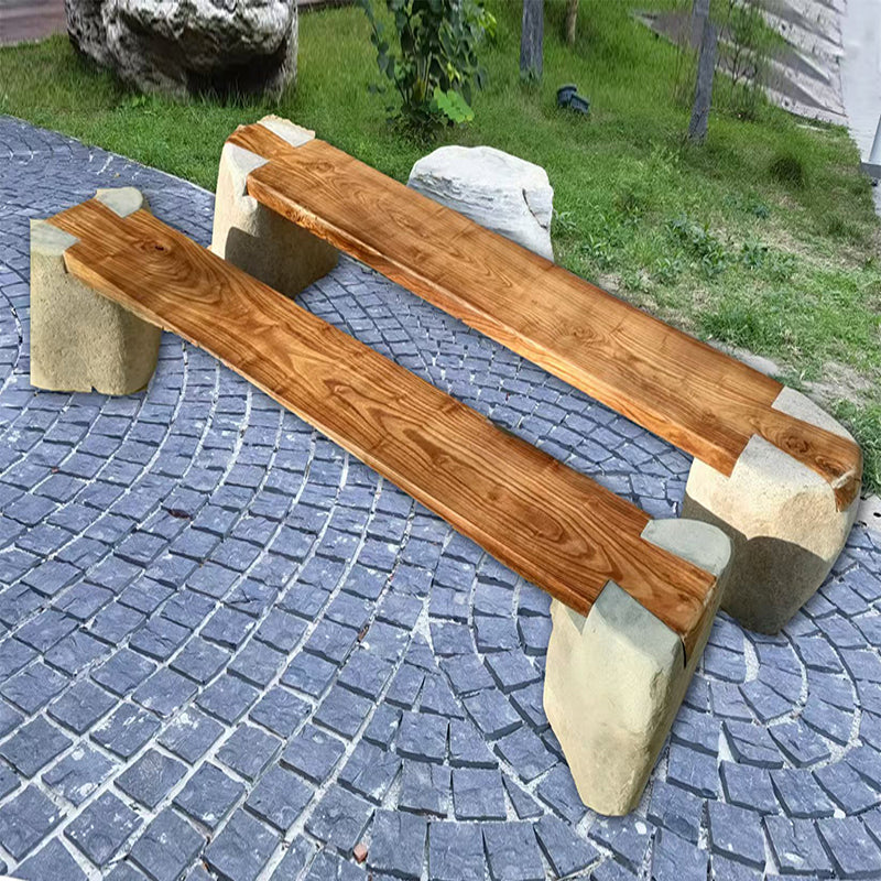 Long bench combining stone and wood