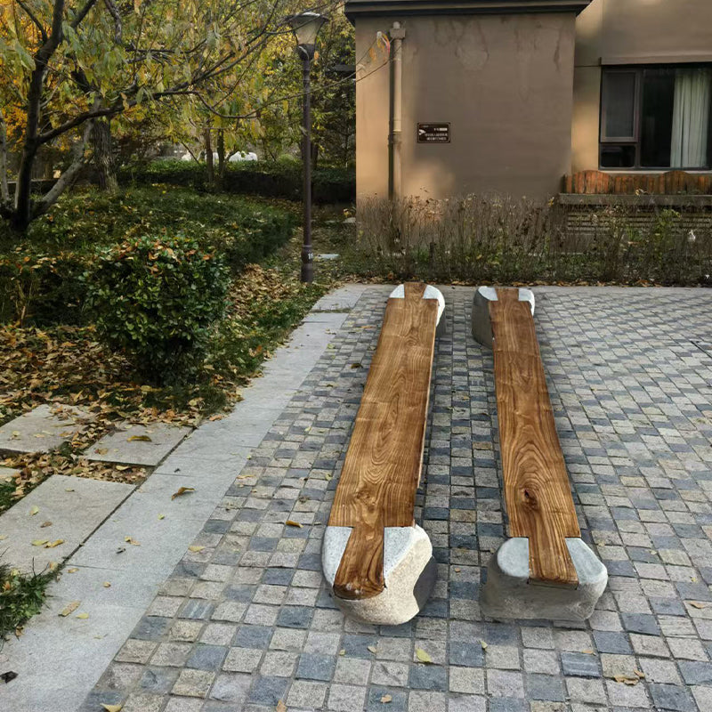 Long bench combining stone and wood