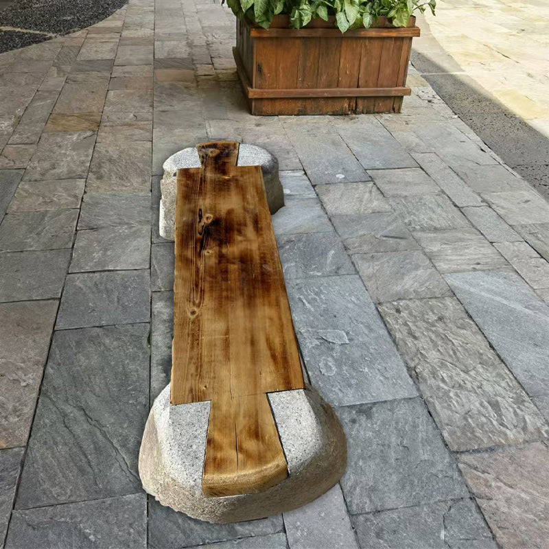 Long bench combining stone and wood